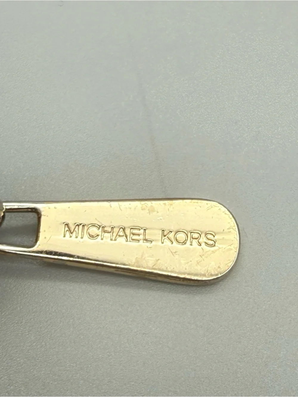 Michael Kors Black Pebbled Leather Zip Around Continental Wallet Logo Plaque